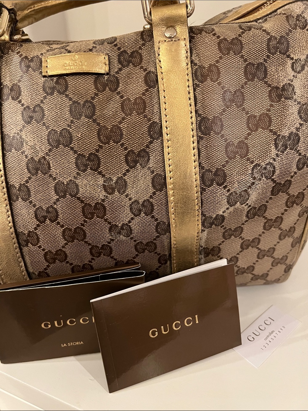Authentic Gucci Gold Metallic Boston
Shoulder Bag